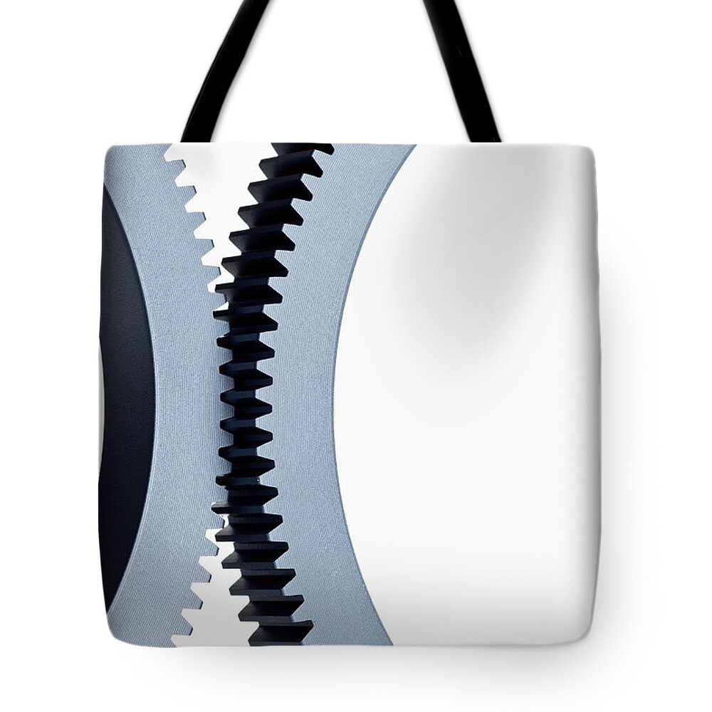Curve Tote Bag featuring the photograph Detail Of Two Cogs by Caspar Benson