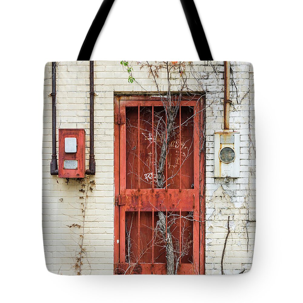 Door Tote Bag featuring the photograph Determination and Perseverance by Jeff Abrahamson