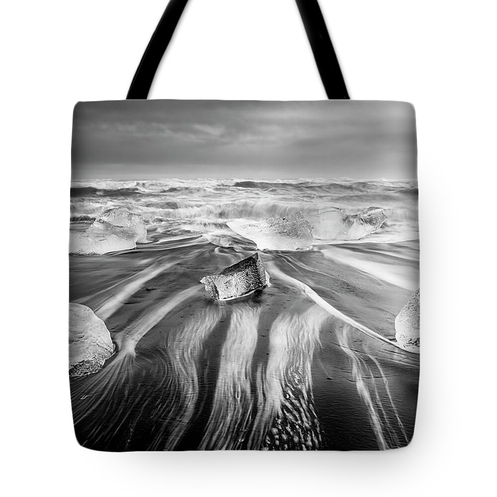 Joan Carroll Tote Bag featuring the photograph Diamond Beach Iceland V BW by Joan Carroll