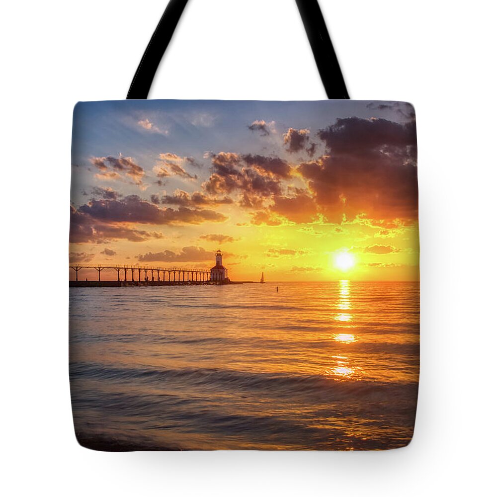 Architecture Tote Bag featuring the photograph Dramatic Sunset at Michigan City East Pierhead Lighthouse by Andy Konieczny