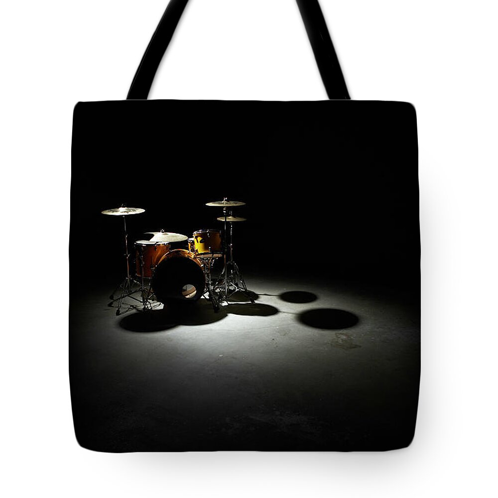 Shadow Tote Bag featuring the photograph Drum Kit, Elevated View by Thomas Northcut