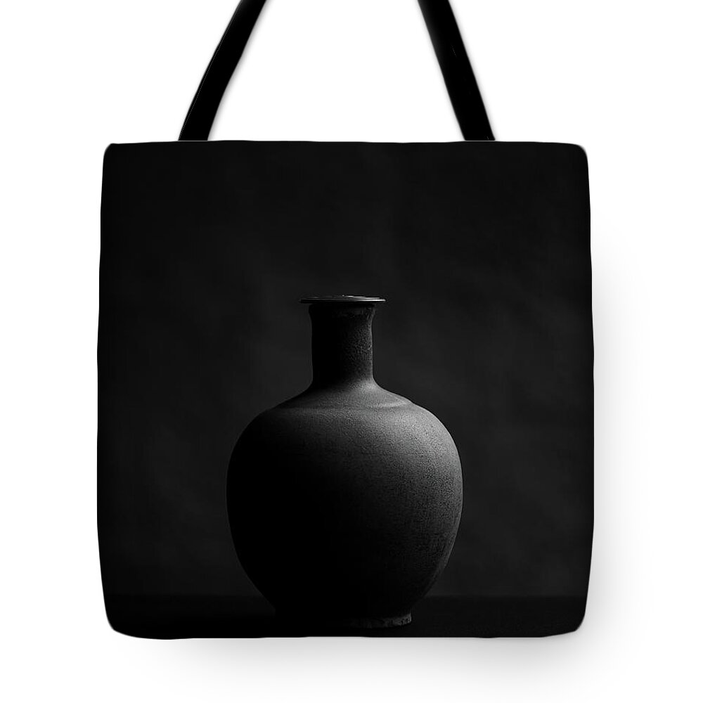Clay Tote Bag featuring the photograph Earthen pot in black and white by Alessandra RC