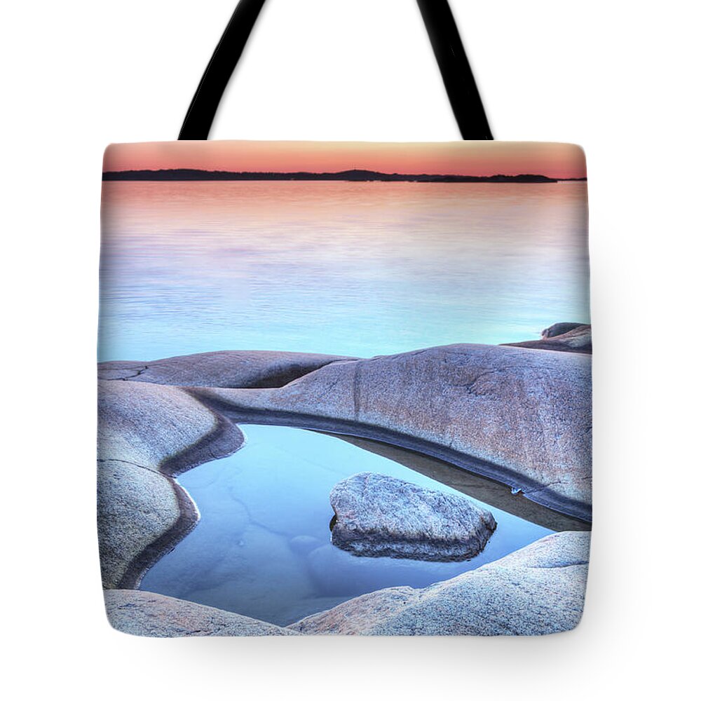 Archipelago Tote Bag featuring the photograph Evening At The Swedish Coastline by Martin Wahlborg
