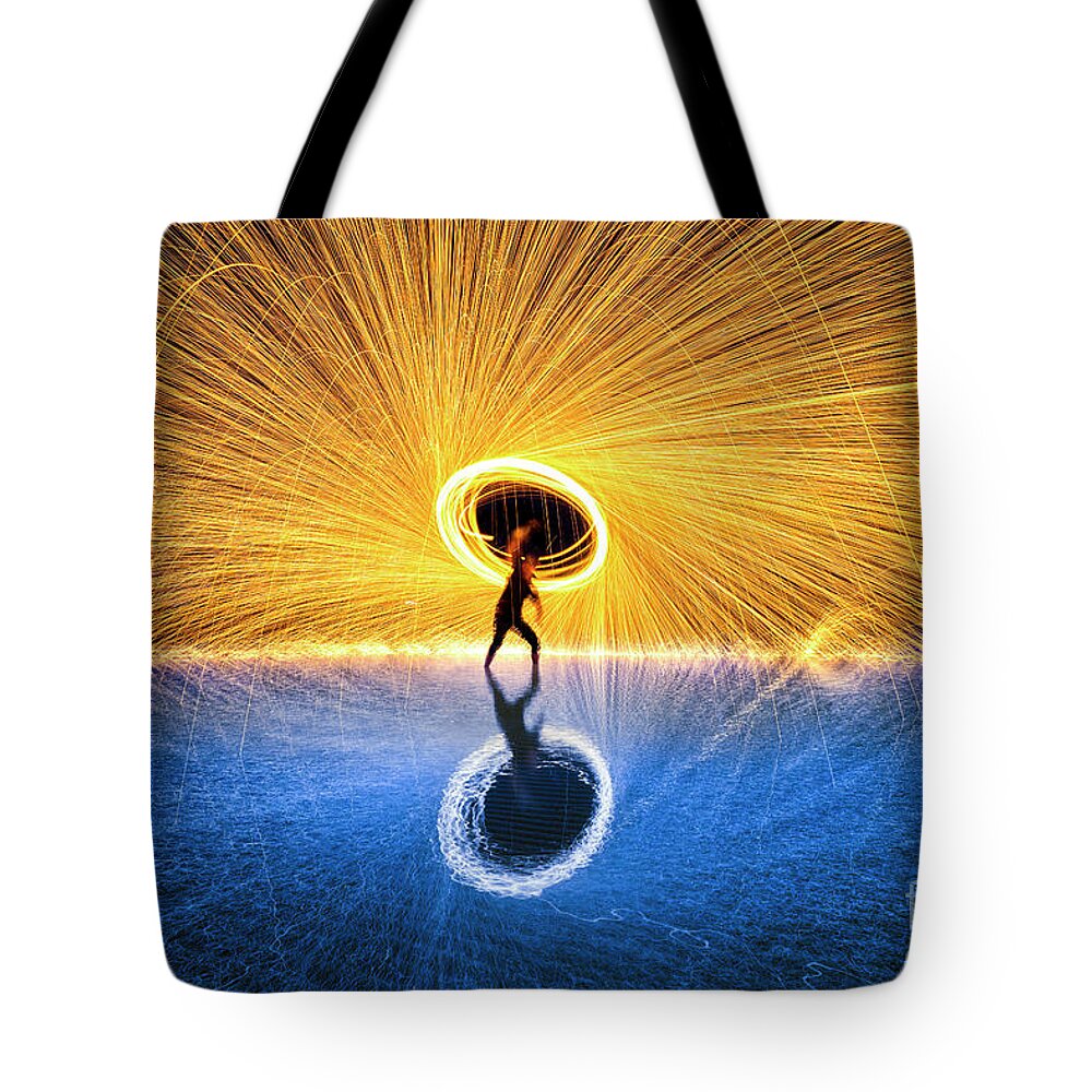 Outdoors Tote Bag featuring the photograph Fine Art 2 Tone Steel Wool Fireworks On by Chanet Wichajutakul