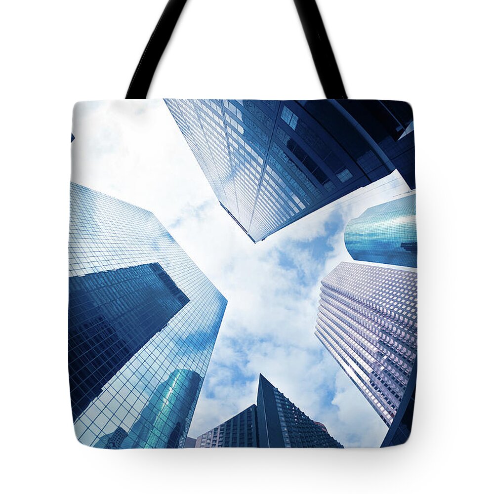 Financial Building Tote Bag featuring the photograph Fish Eye View Of The Skyscrapers In The by Moreiso