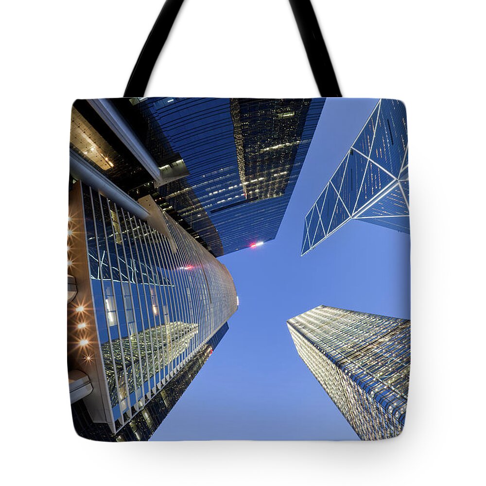 Chinese Culture Tote Bag featuring the photograph Fisheye View Of Hong Kong Skyscrapers by Winhorse