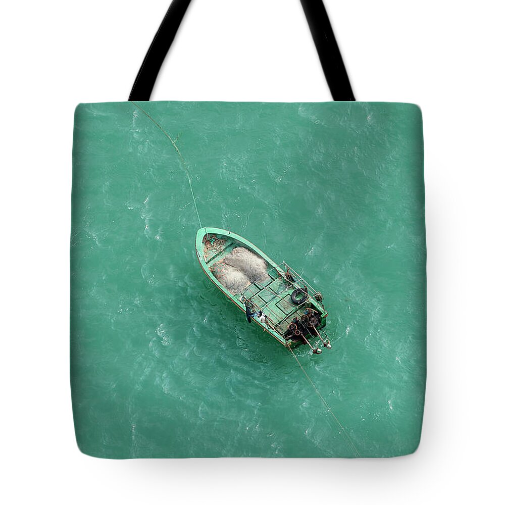 Outdoors Tote Bag featuring the photograph Fishing Boat Moored Off Coast, Sanya by Paul Todd