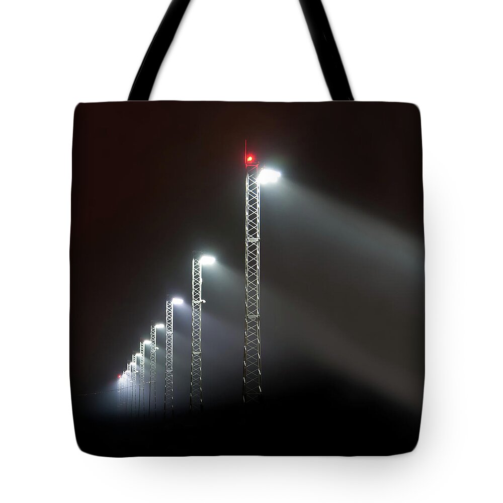 Tranquility Tote Bag featuring the photograph Floodlight by Tore Thiis Fjeld