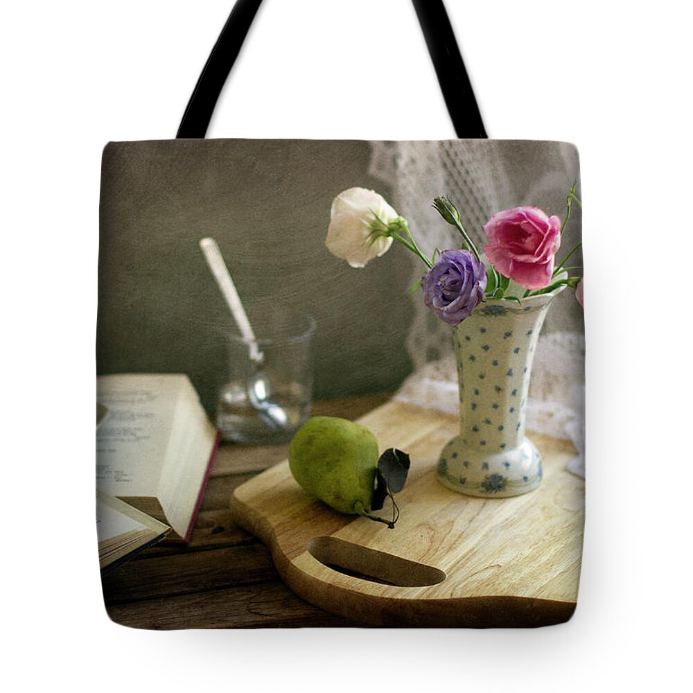 Vase Tote Bag featuring the photograph Flower Vase And Pear On Board by Copyright Anna Nemoy(xaomena)