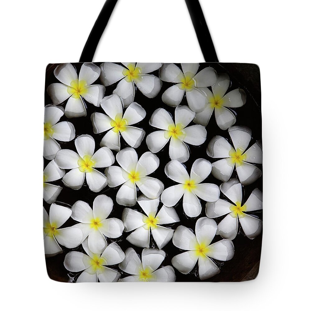 Bucket Tote Bag featuring the photograph Flowers In Water by John W Banagan