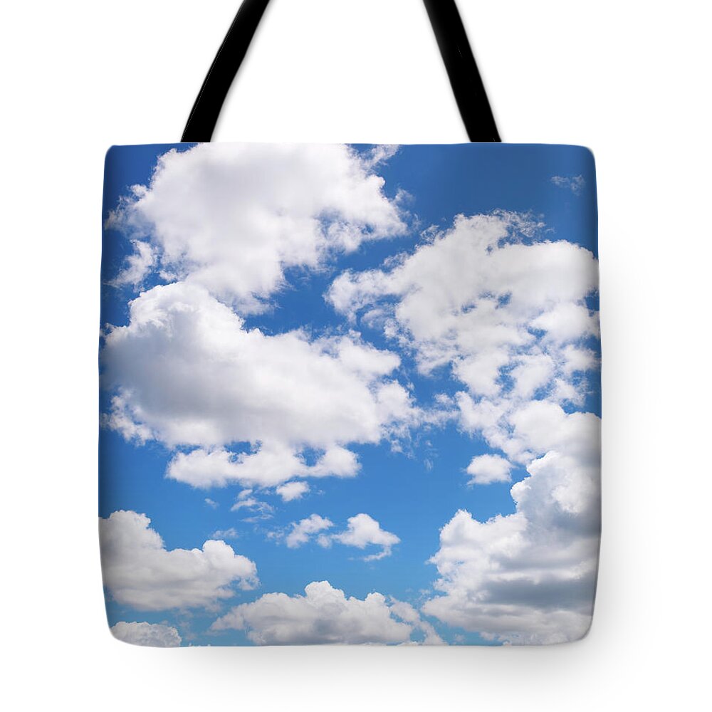 Sunlight Tote Bag featuring the photograph Fluffy Clouds Xxl - Vertical by Turnervisual