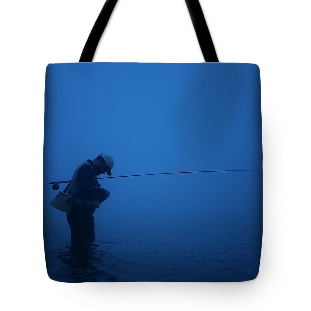Young Men Tote Bag featuring the photograph Fly Fisherman by Mike Kemp