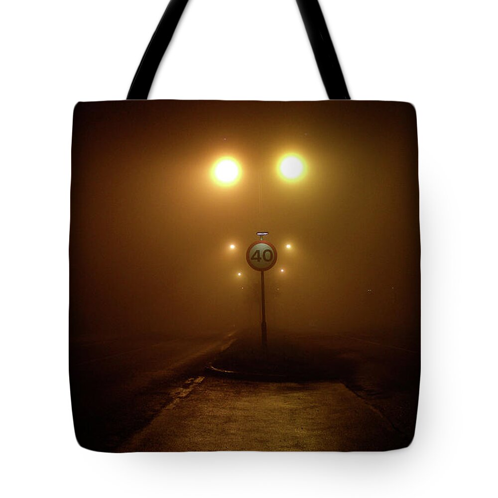 Speed Limit Sign Tote Bag featuring the photograph Fog Light by Dan Bass