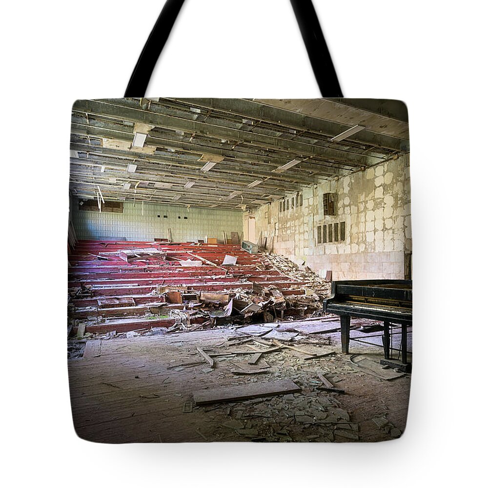 Urban Tote Bag featuring the photograph Former Theatre in Pripyat, Chernobyl by Roman Robroek