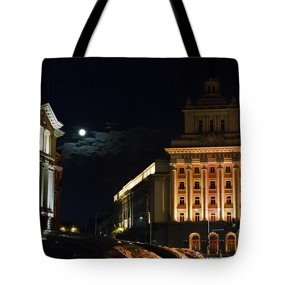 Sofia Tote Bag featuring the photograph Full moon above Sofia Largo downtown by Yavor Mihaylov