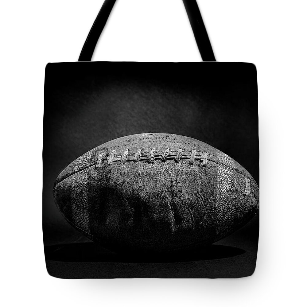 Antique Tote Bag featuring the photograph Game Ball - Black and White by Peter Tellone