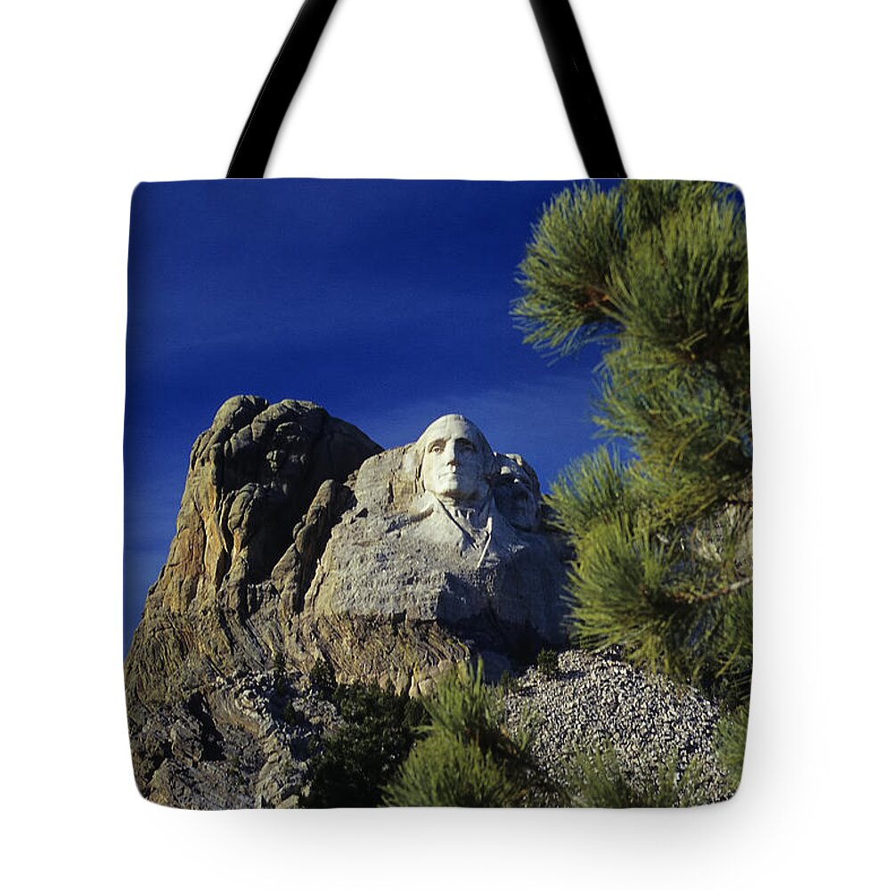 Mount Rushmore. George Washington Tote Bag featuring the photograph George No.2 - A Mount Rushmore Impression by Steve Ember