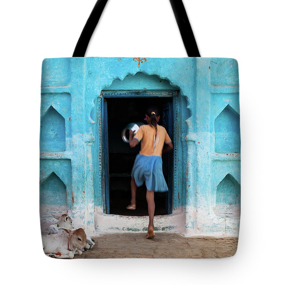 Child Tote Bag featuring the photograph Girl And Two Calves In Front Of Blue by Marji Lang