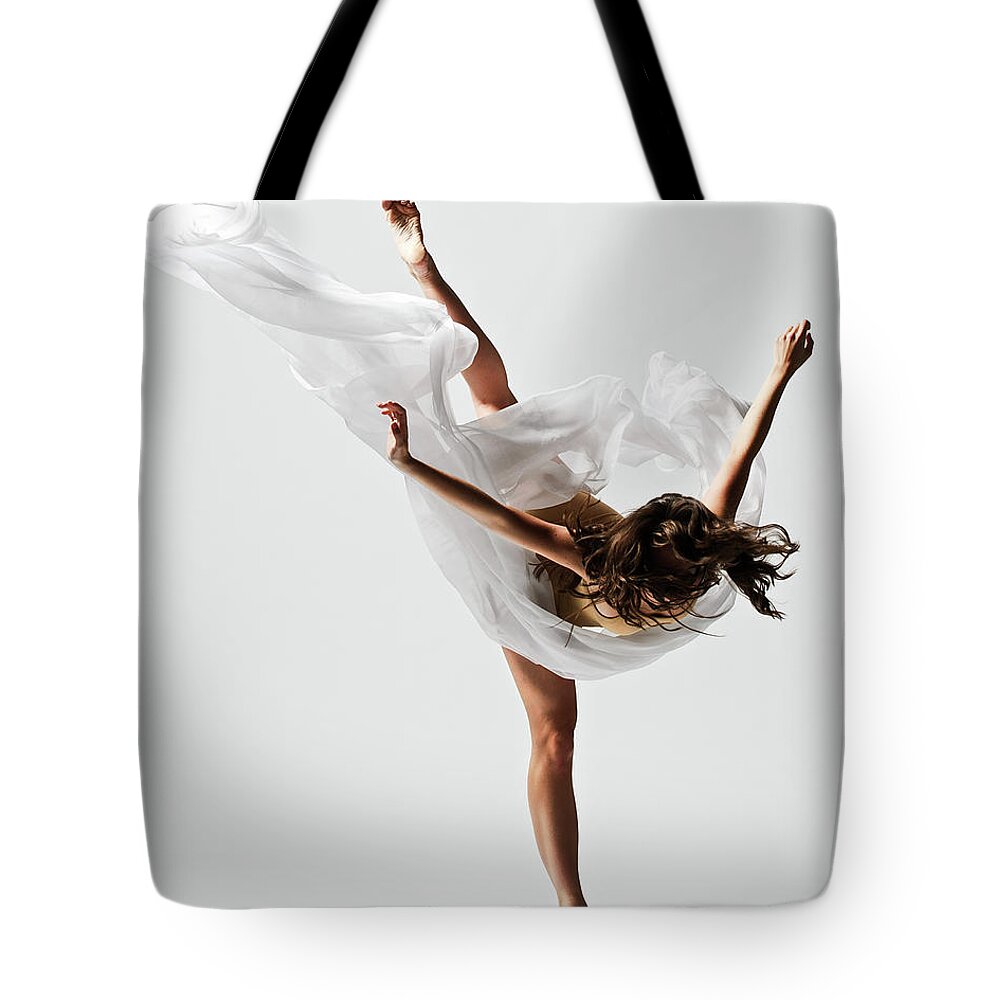 Ballet Dancer Tote Bag featuring the photograph Girl Dancing by Copyright Christopher Peddecord 2009