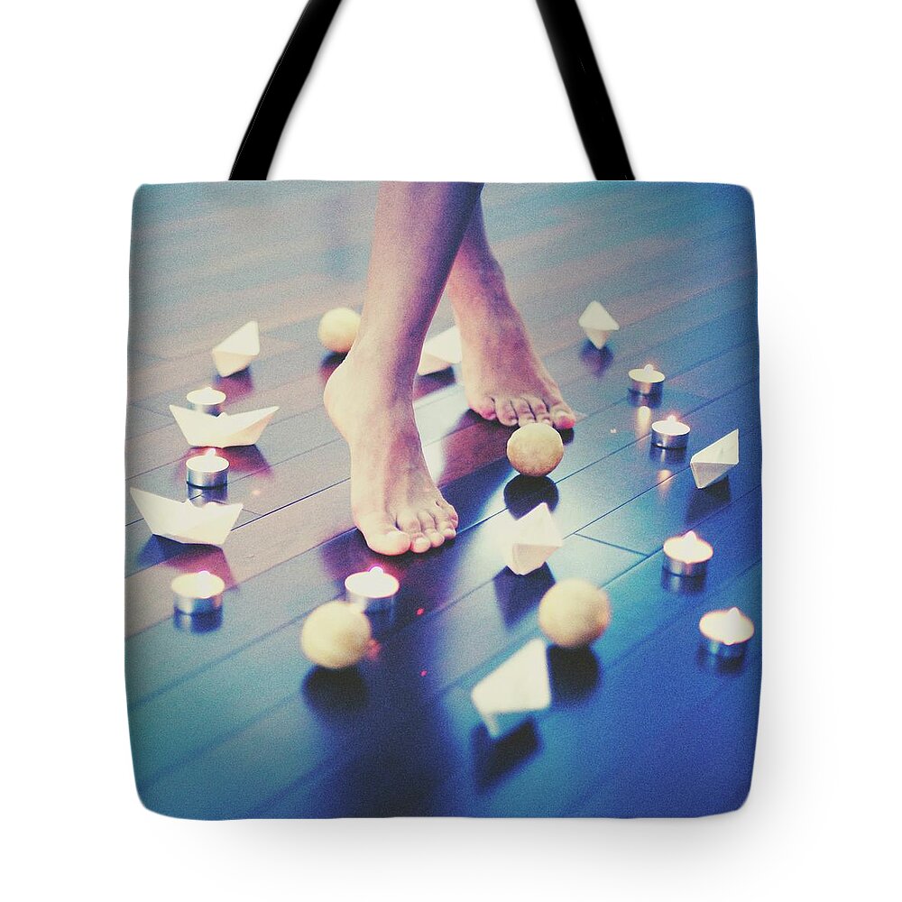 Shadow Tote Bag featuring the photograph Girl Dancing In Candle Lights Bare Feet by Bravo Les Filles