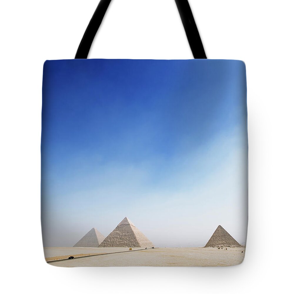 Clear Sky Tote Bag featuring the photograph Giza Pyramids by Roine Magnusson