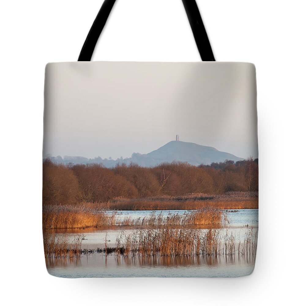 Scenics Tote Bag featuring the photograph Glastonbury Tor In Distance by Matthew Shaw