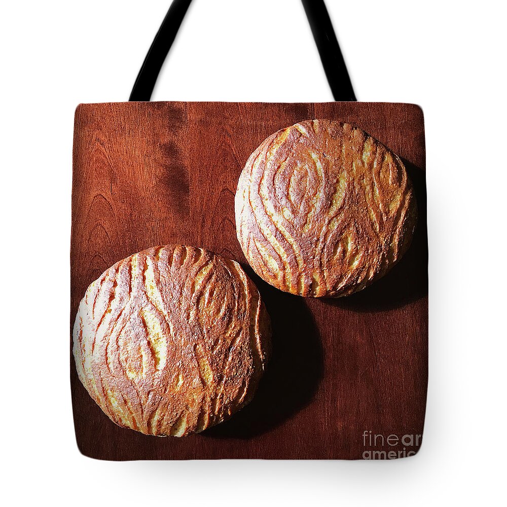 Bread Tote Bag featuring the photograph Golden Woodgrain Scored Sourdough by Amy E Fraser