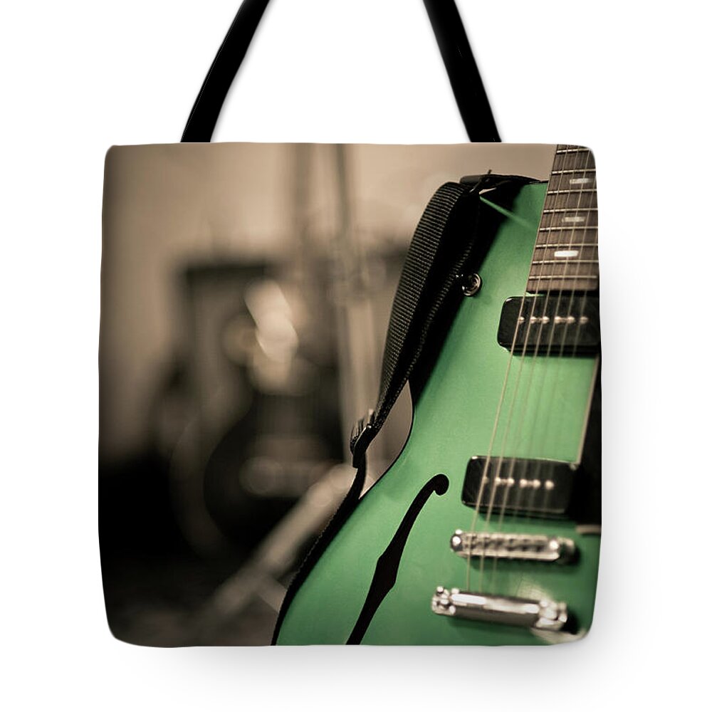 Music Tote Bag featuring the photograph Green Electric Guitar With Blurry by Sean Molin - Www.seanmolin.com