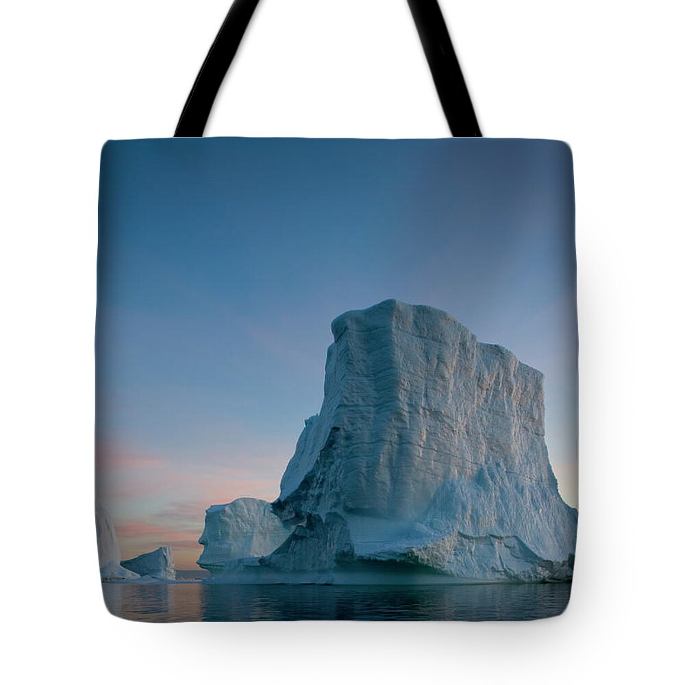 Iceberg Tote Bag featuring the photograph Greenland, Disko Bay, Massive Icebergs by Paul Souders
