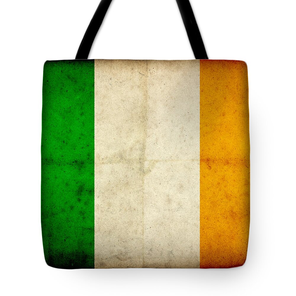 Weathered Tote Bag featuring the photograph Grunge Irish Flag On Rough Edged Old by Abzee