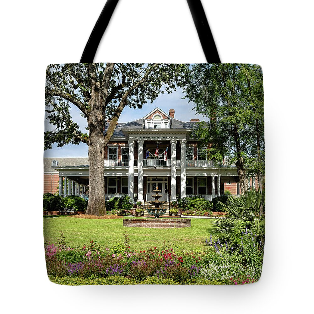 Guignard Tote Bag featuring the photograph Guignard Mansion by Charles Hite
