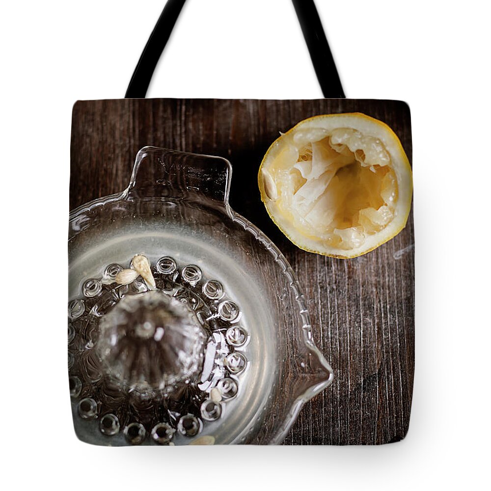 Empty Tote Bag featuring the photograph Halfs Of Squeezed Lemon, Lemon Squeezer by Westend61