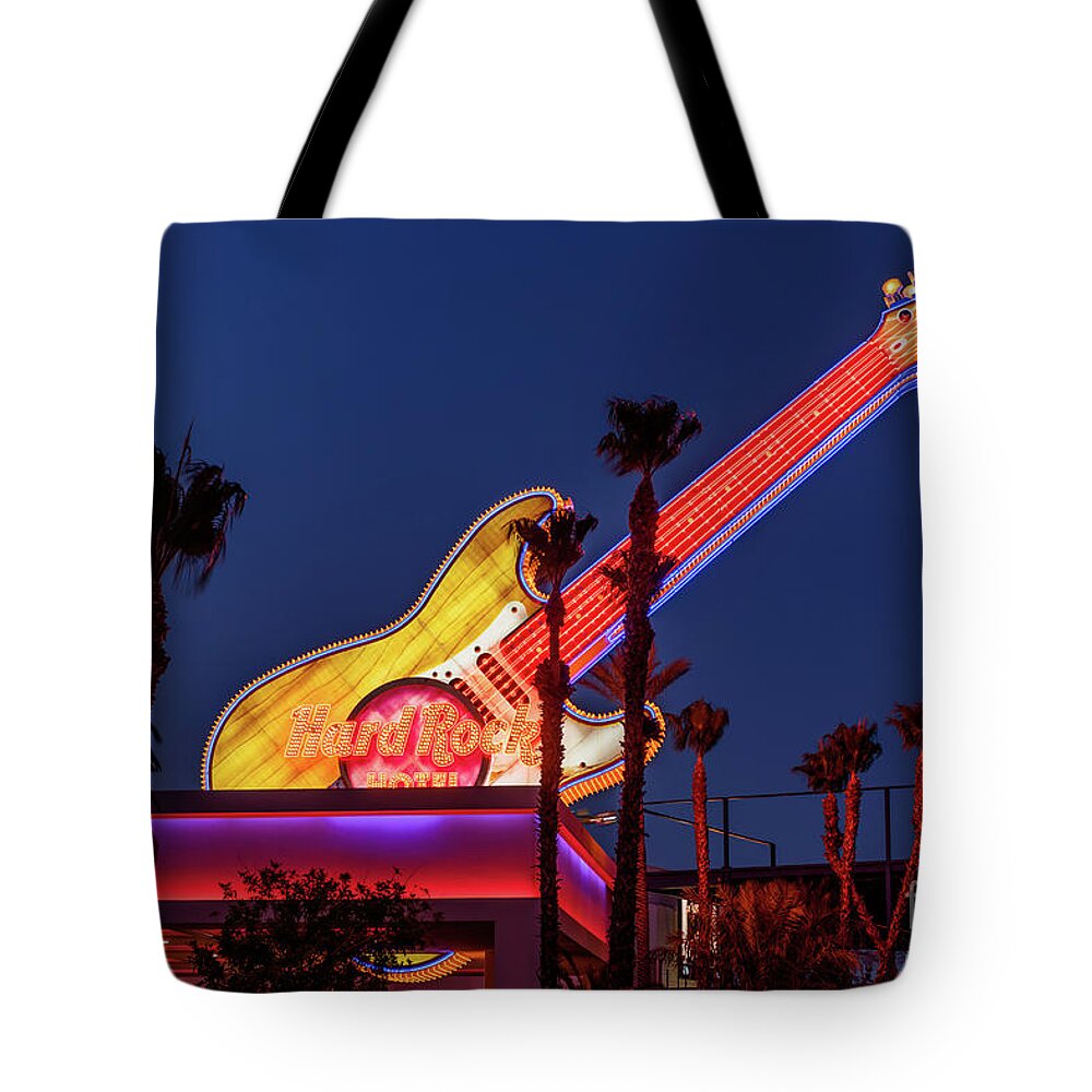 Las Vegas Strip Tote Bag featuring the photograph Hard Rock Casino Con Air Guitar at Dusk From West by Aloha Art