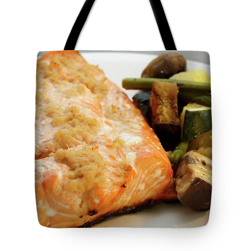 Indian Tote Bag featuring the photograph Healthy Salmon dinner with roasted vegetables by Kyle Lee