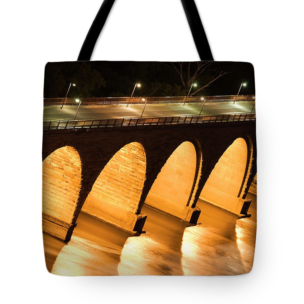 Pedestrian Tote Bag featuring the photograph Historic Stone Arch Bridge Over The by Jimkruger