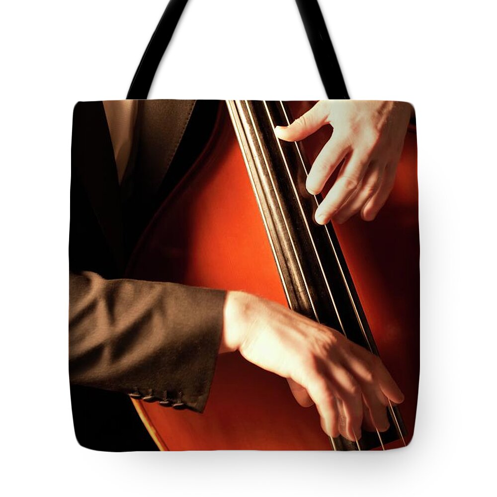 People Tote Bag featuring the photograph Hnads Plucking Fingerboard Of Double by Moodboard