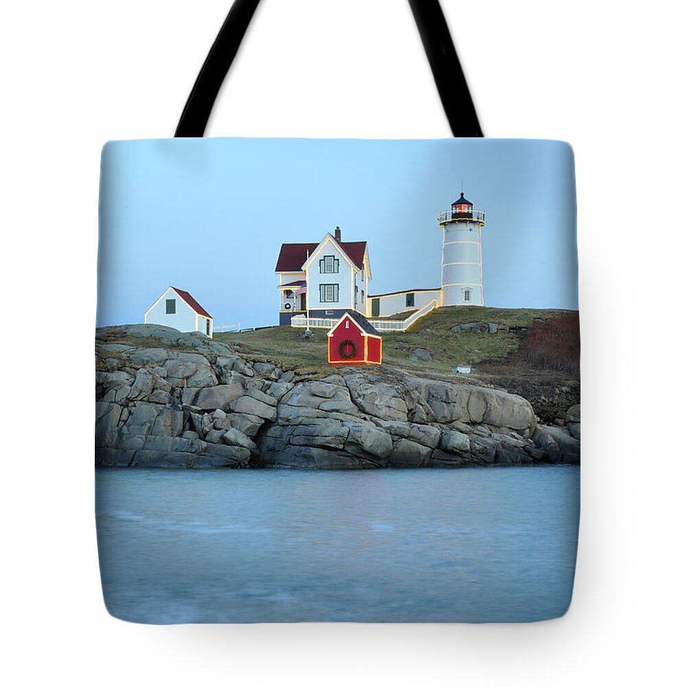 Nubble Lighthouse Tote Bag featuring the photograph Holiday Nubble on the Rocks by Luke Moore