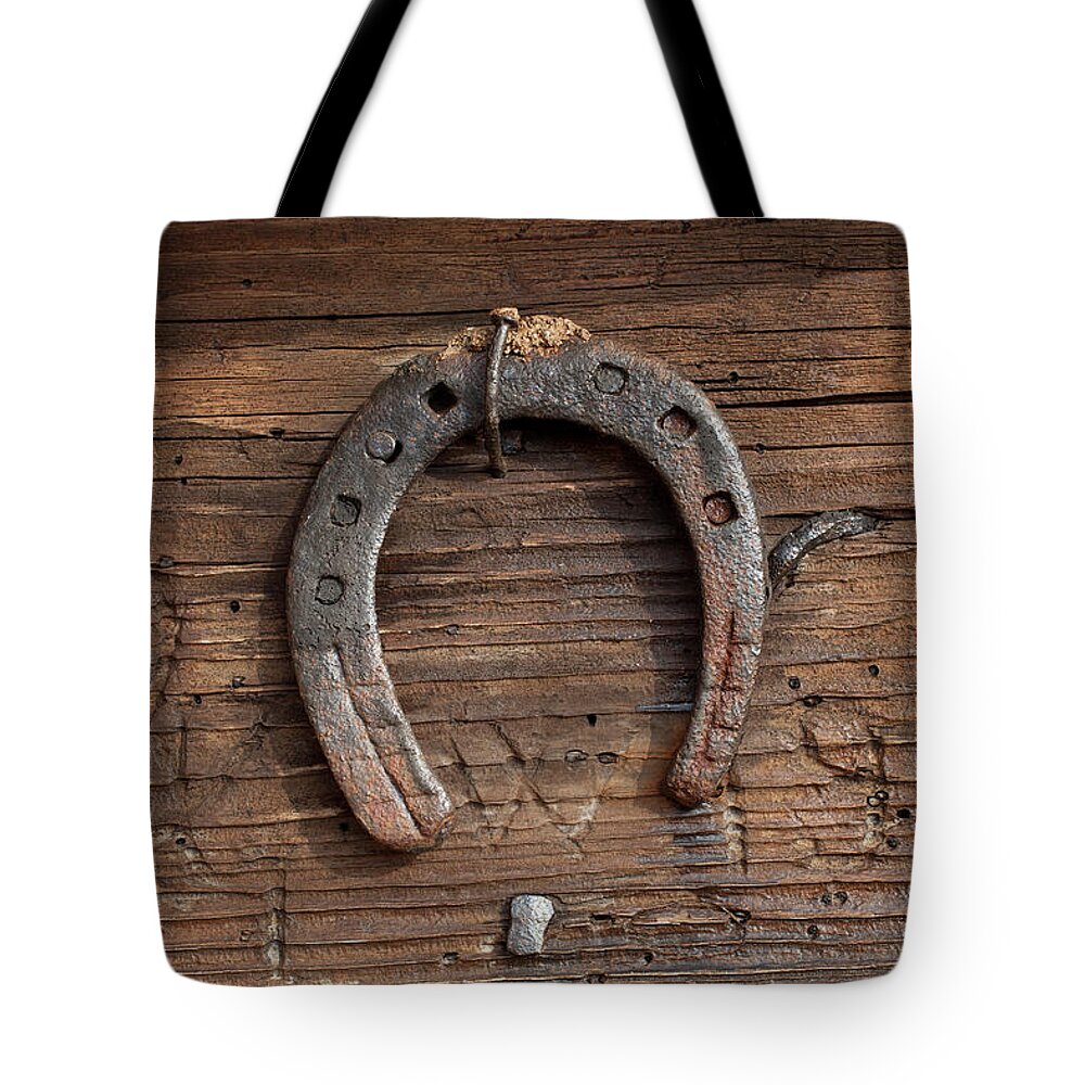 Horse Tote Bag featuring the photograph Horseshoe by Malerapaso