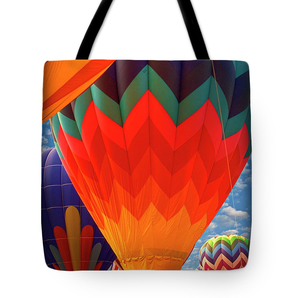 Up And Away Tote Bag featuring the photograph Hot Air Balloons Vertical by David Zanzinger