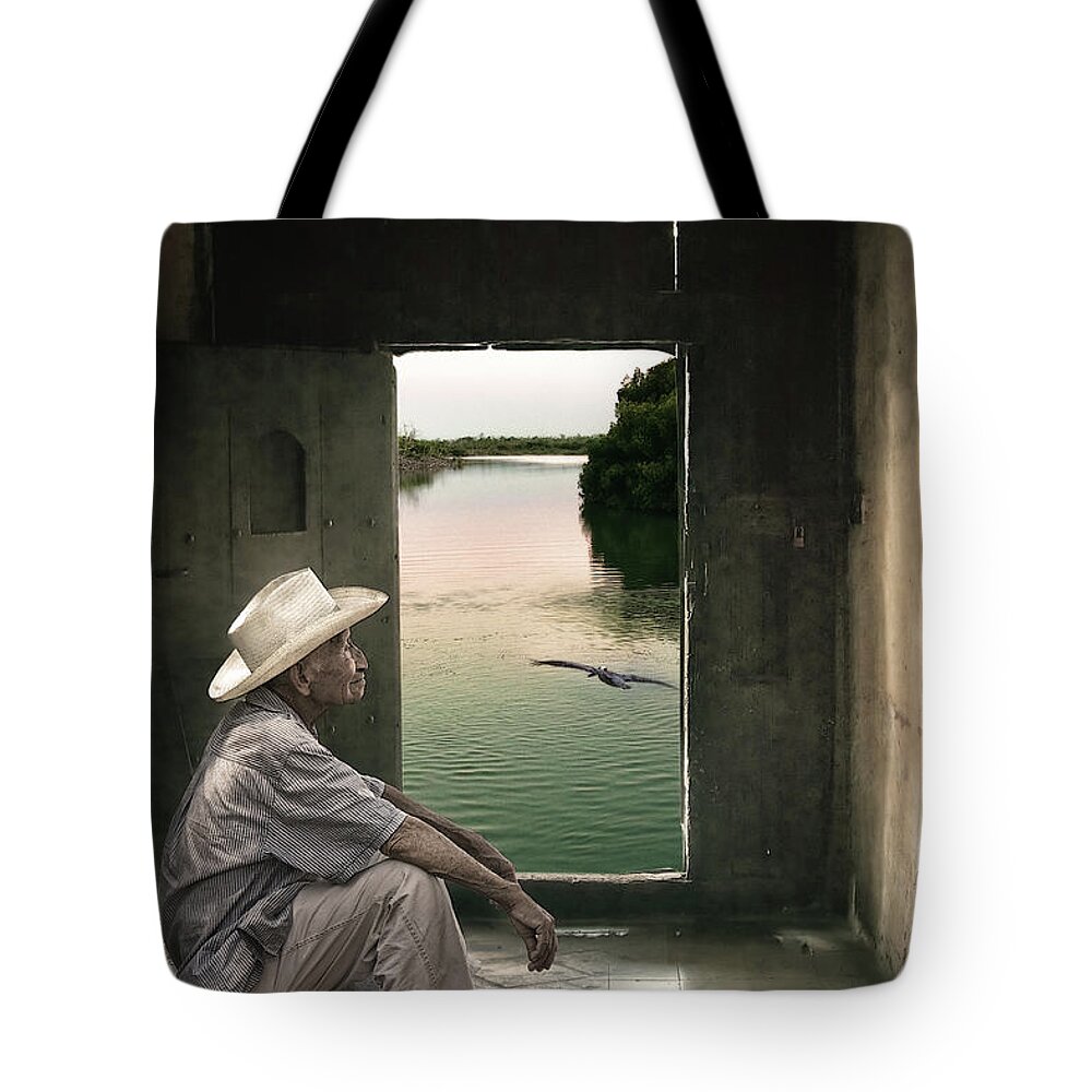Merida Tote Bag featuring the photograph I hear it in the deep heart's core by Tatiana Travelways