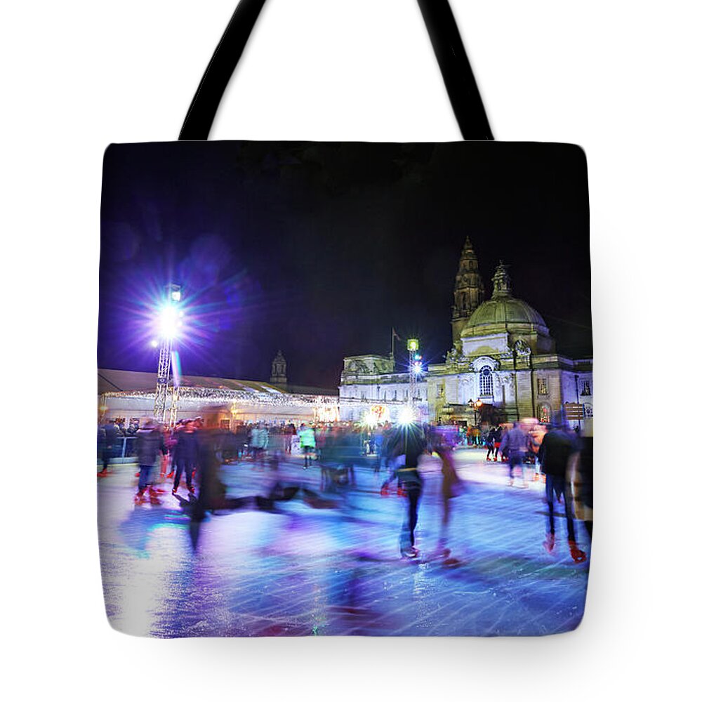 People Tote Bag featuring the photograph Ice Rink With Cardiff City Hall by Allan Baxter