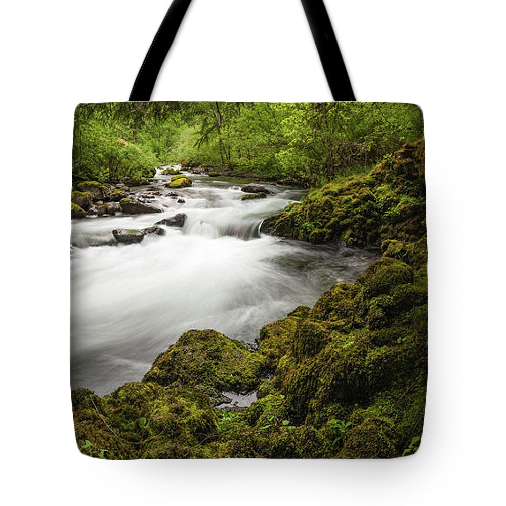 Scenics Tote Bag featuring the photograph Idyllic Forest River Rushing Through by Fotovoyager