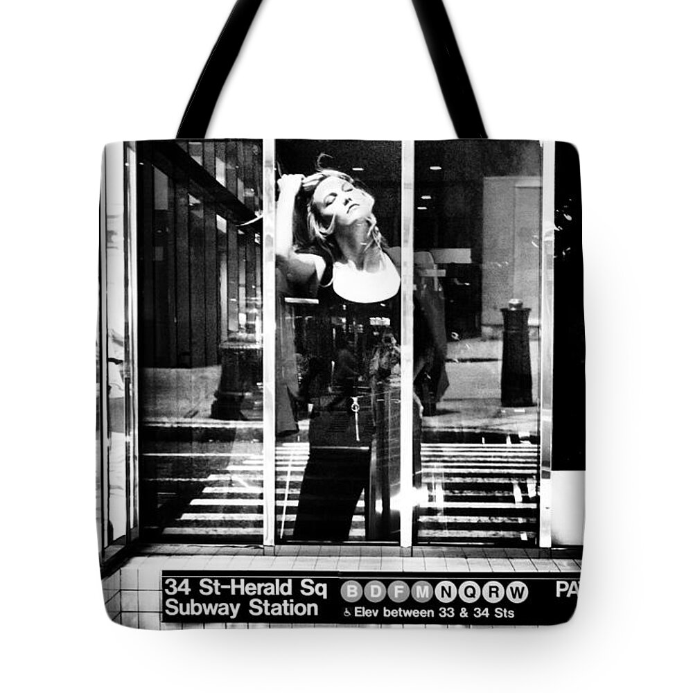 Black And White Tote Bag featuring the photograph I'll Take the Uptown Express... by Steve Ember