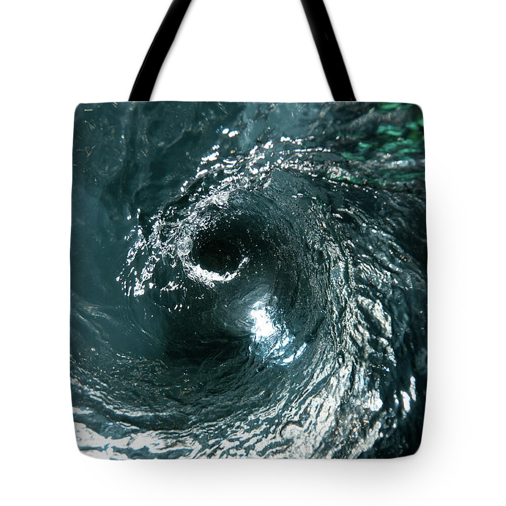 Hole Tote Bag featuring the photograph Illuminated Blue Water Vortex by 400tmax