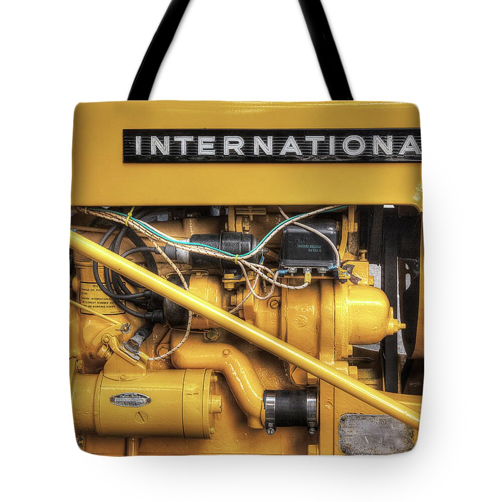 Tractor Tote Bag featuring the photograph International Cub Engine by Mike Eingle