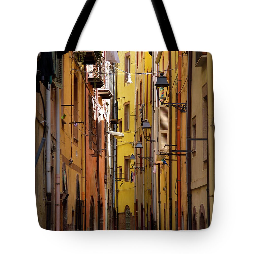 Mature Adult Tote Bag featuring the photograph Italy, Sardinia, Bosa, Sitting In The by Aldo Pavan