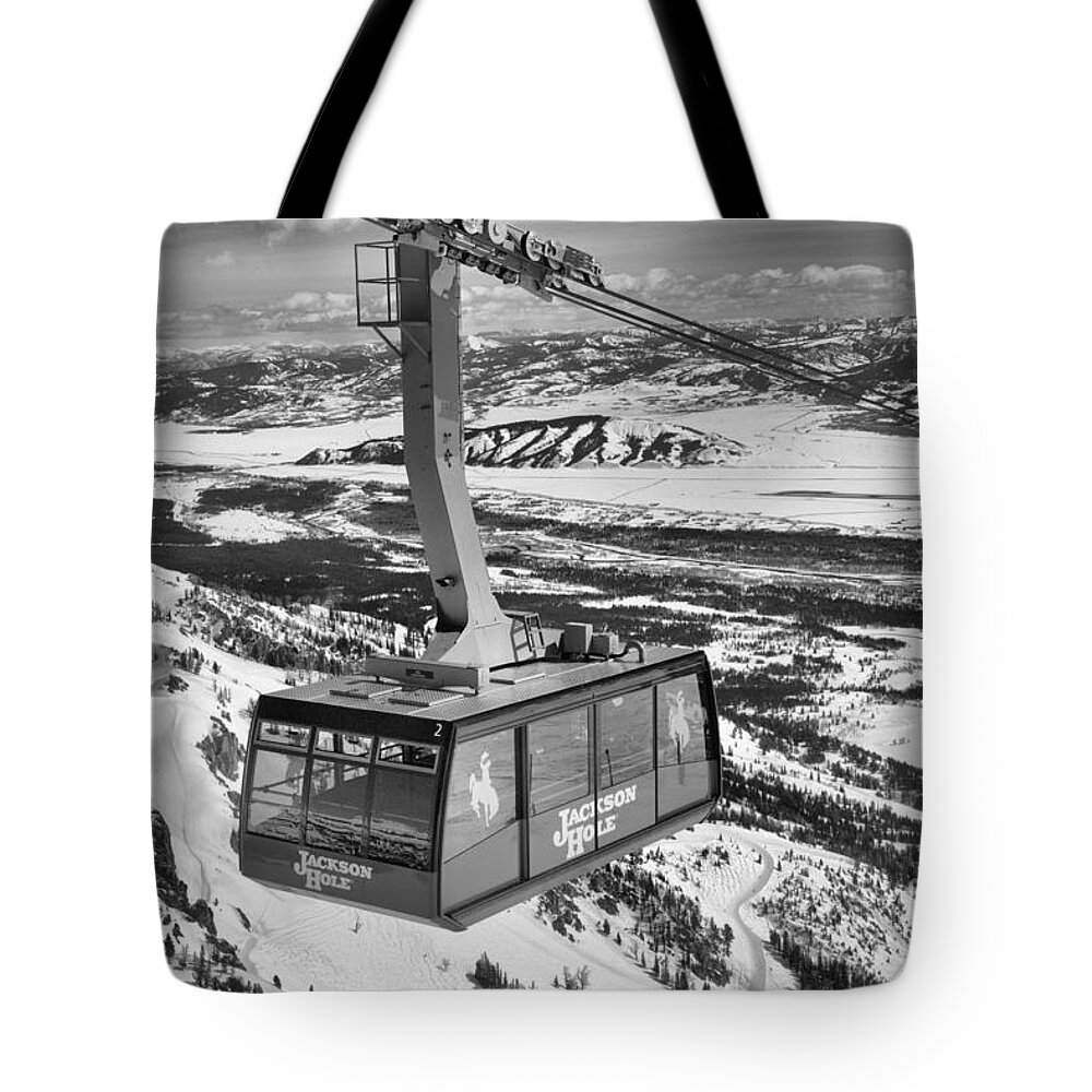 Jackson Hole Tram Tote Bag featuring the photograph Jackson Hole Tram In The Skies Black And White by Adam Jewell