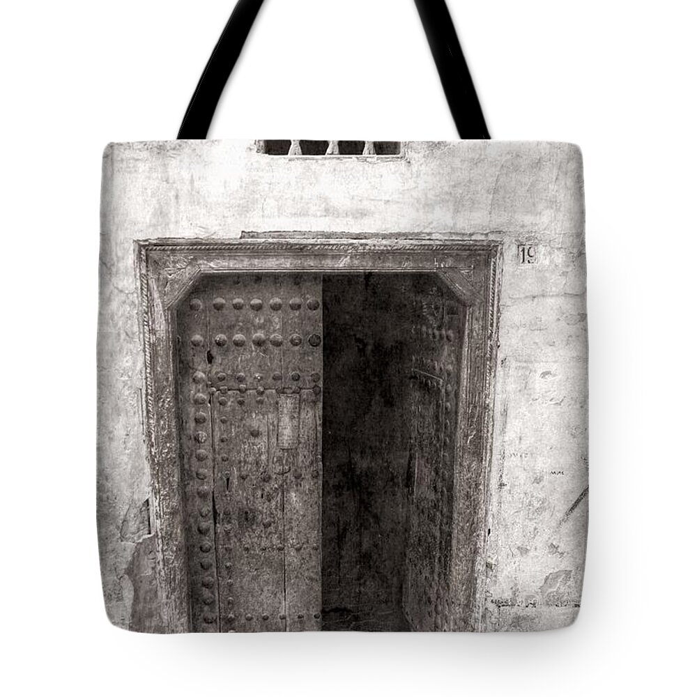 Morocco Tote Bag featuring the photograph Kitten Old Ancient Door Fes Morocco by Chuck Kuhn