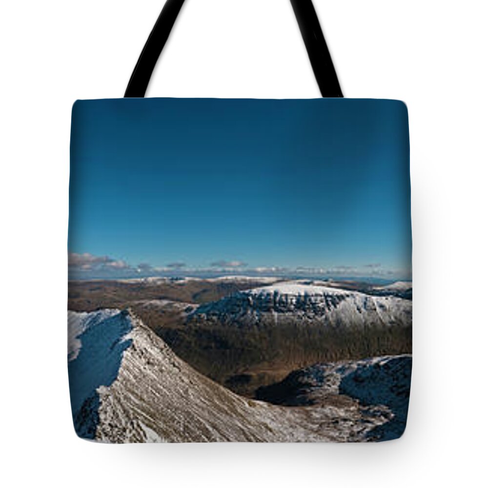 Scenics Tote Bag featuring the photograph Lake District Snow Summit Sunburst by Fotovoyager