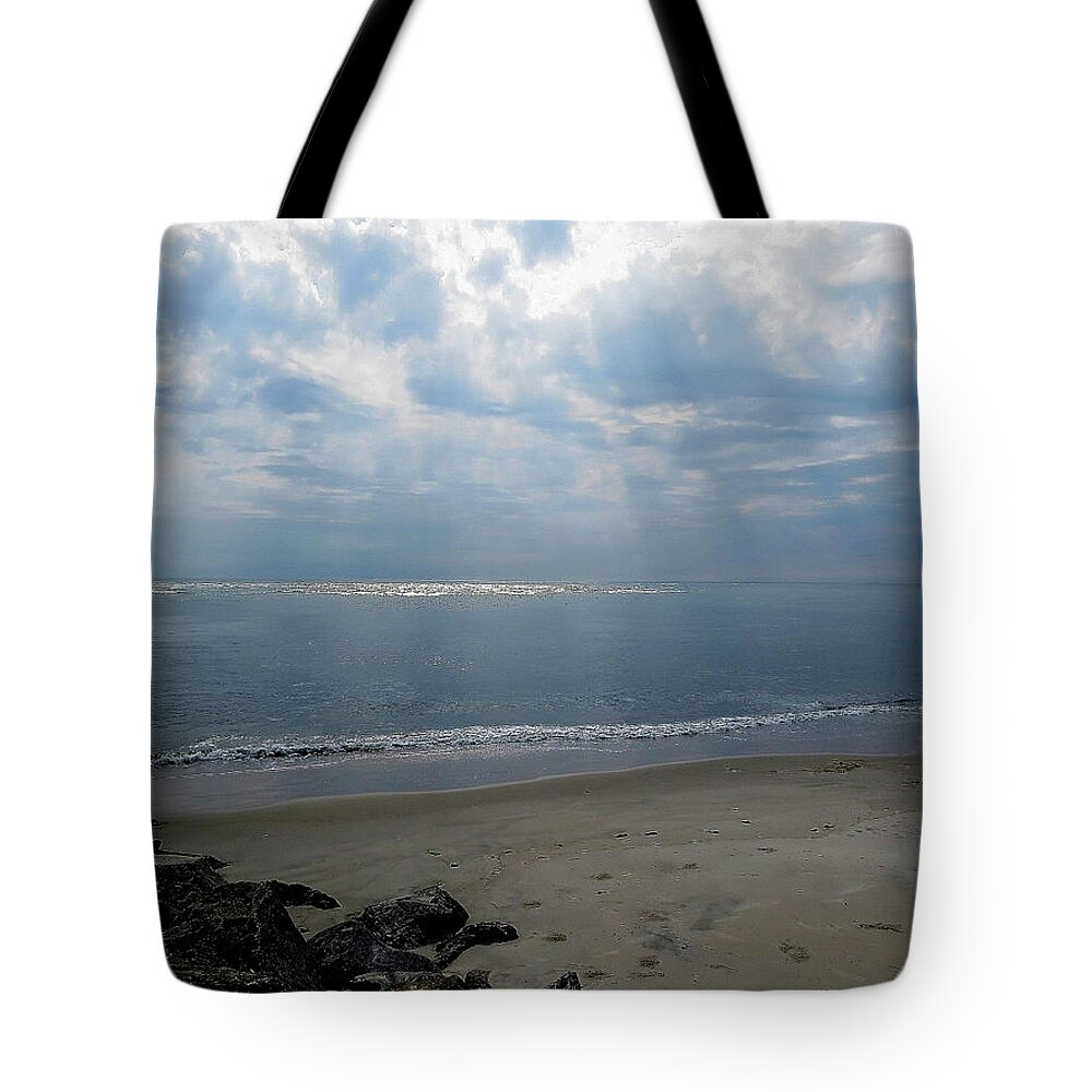 Beach Tote Bag featuring the photograph Land Sea and Sky by Linda Stern